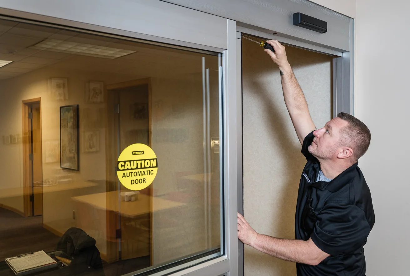 Adjusting an automatic sliding door sensor and motor