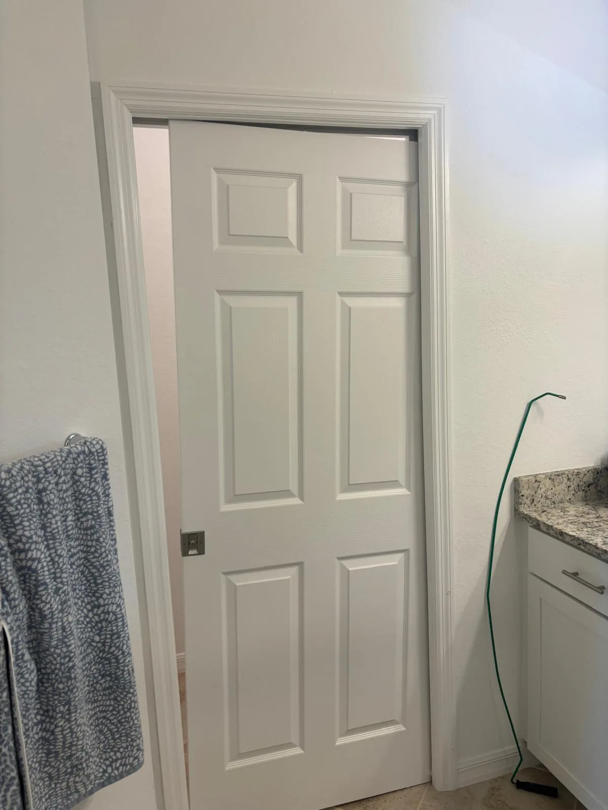 Pocket door stuck in wall cavity that needs repair