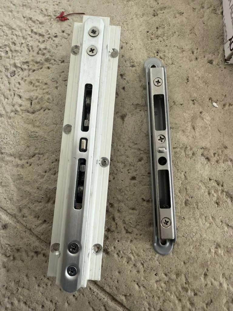 Heavy-duty lock mount on a hurricane impact sliding door