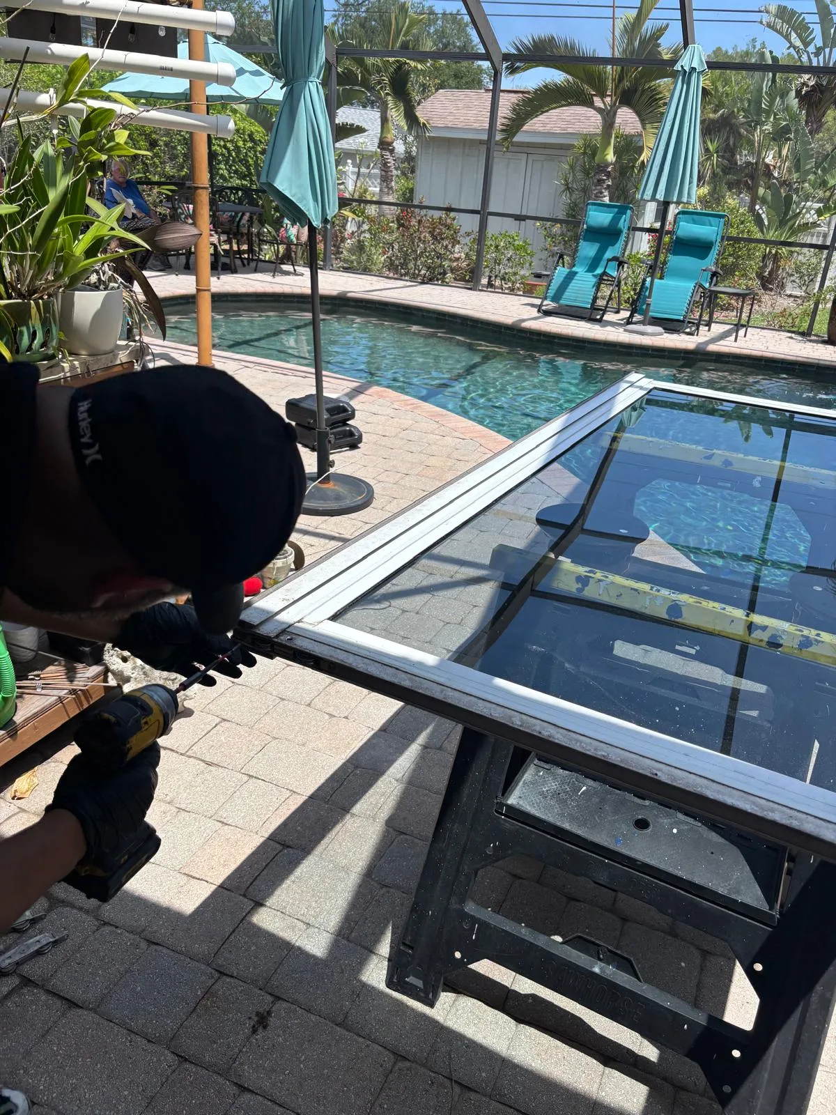 Replacing rollers on a sliding door panel