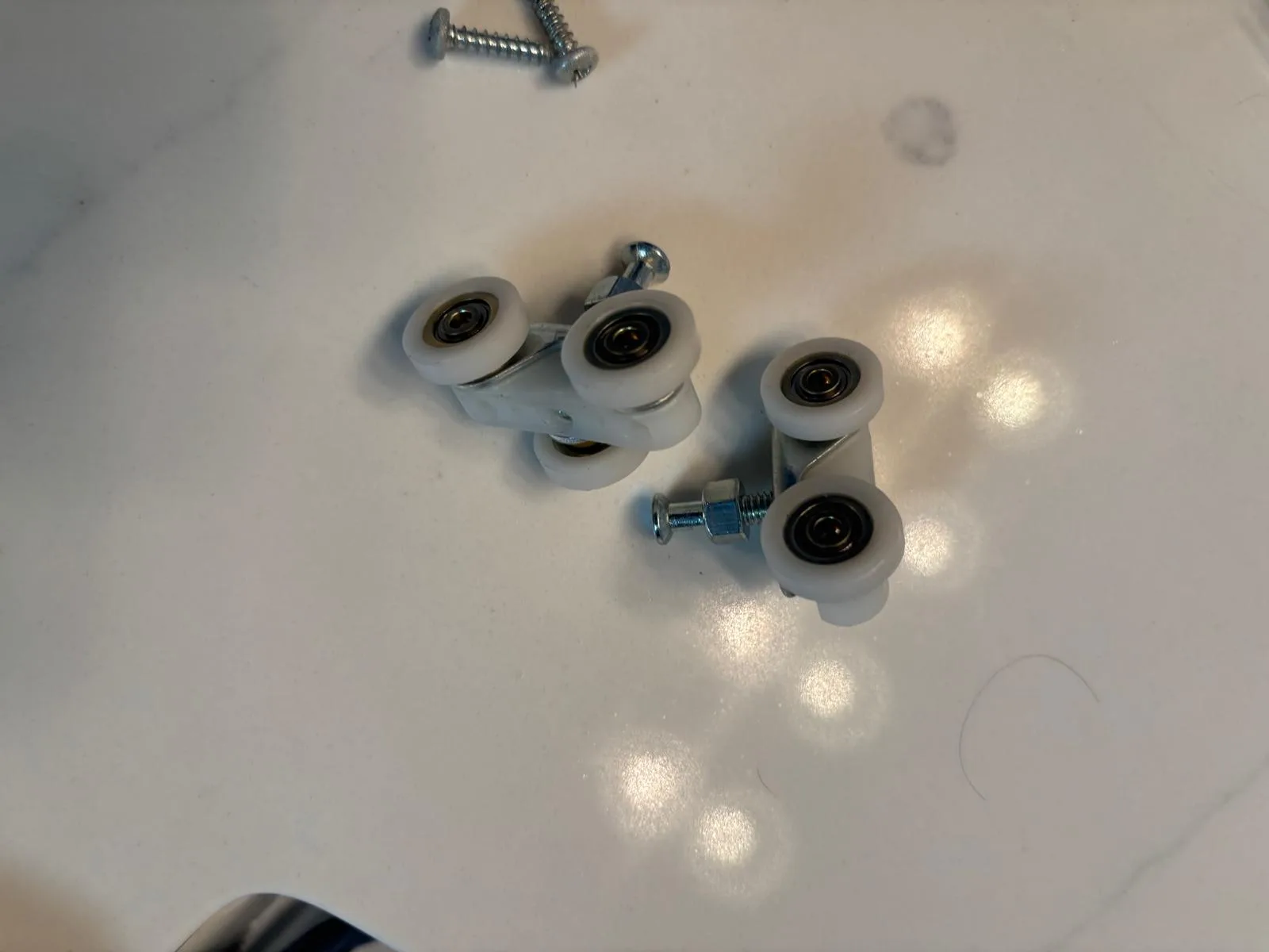 Replacing worn rollers on a pocket door