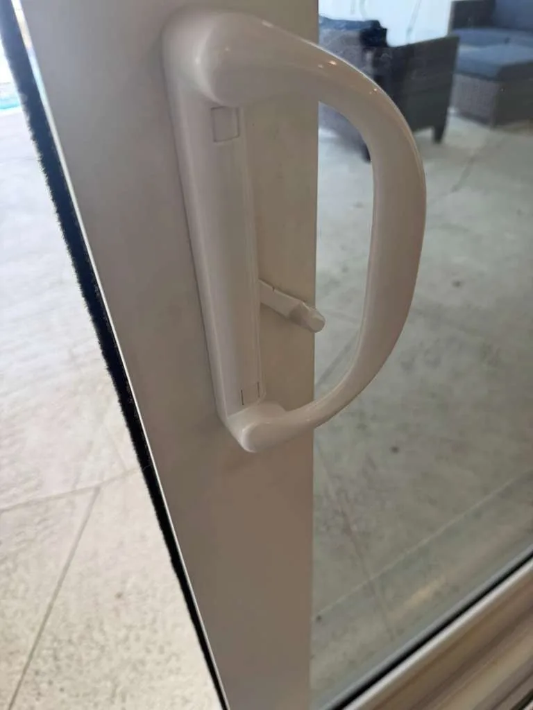 Replaced broken sliding door handle assembly