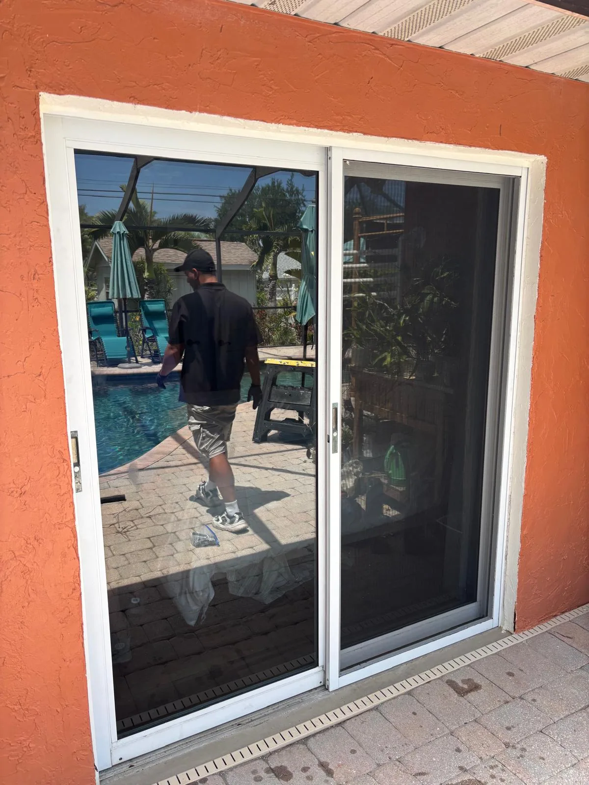 Sliding door repair in progress at a Fort Pierce residence